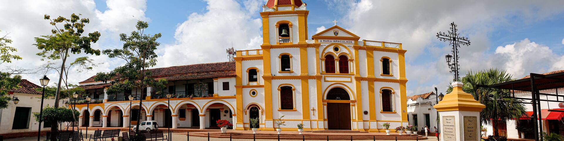 Panorama of Iglesia La Inmaculada Concepcion (church of the Inmaculate Conception), with cross in foreground, Santa Cruz de Mompox, World Heritage