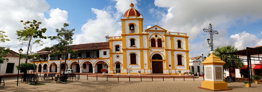 Panorama of Iglesia La Inmaculada Concepcion (church of the Inmaculate Conception), with cross in foreground, Santa Cruz de Mompox, World Heritage