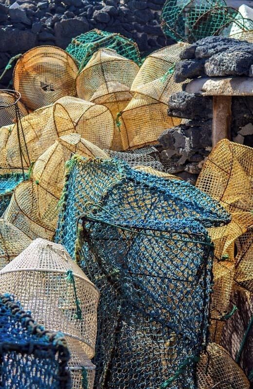 Interesting cluster of fishing nets near to fishing harbour in La Santa, Lanzarote.