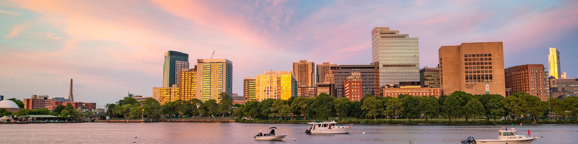 Downtown Boston which includes a city, a bay or harbor and a sunset