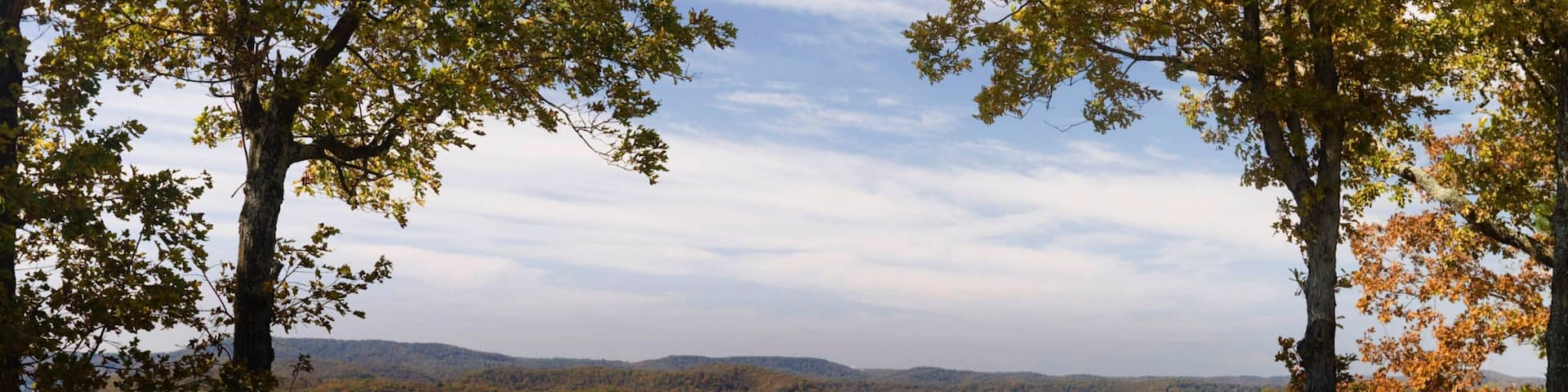 Beaver Lake which includes a lake or waterhole, forests and autumn leaves