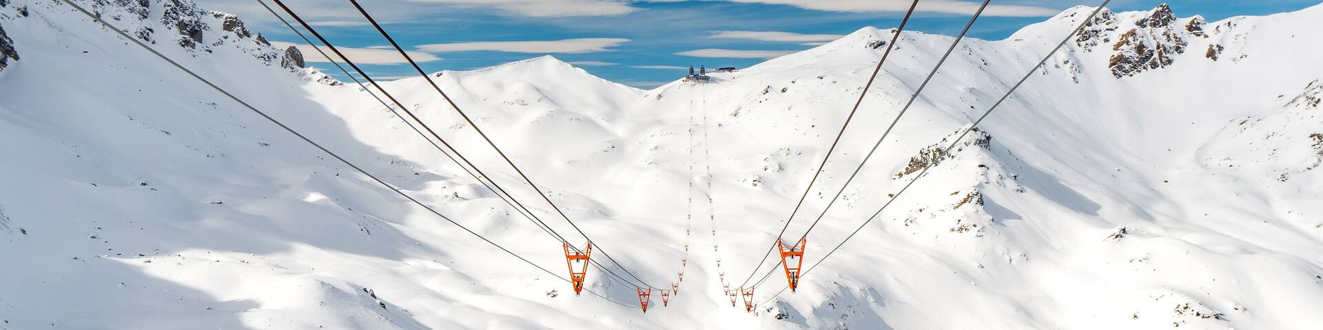 ski lift in arosa switzerland blue sky
