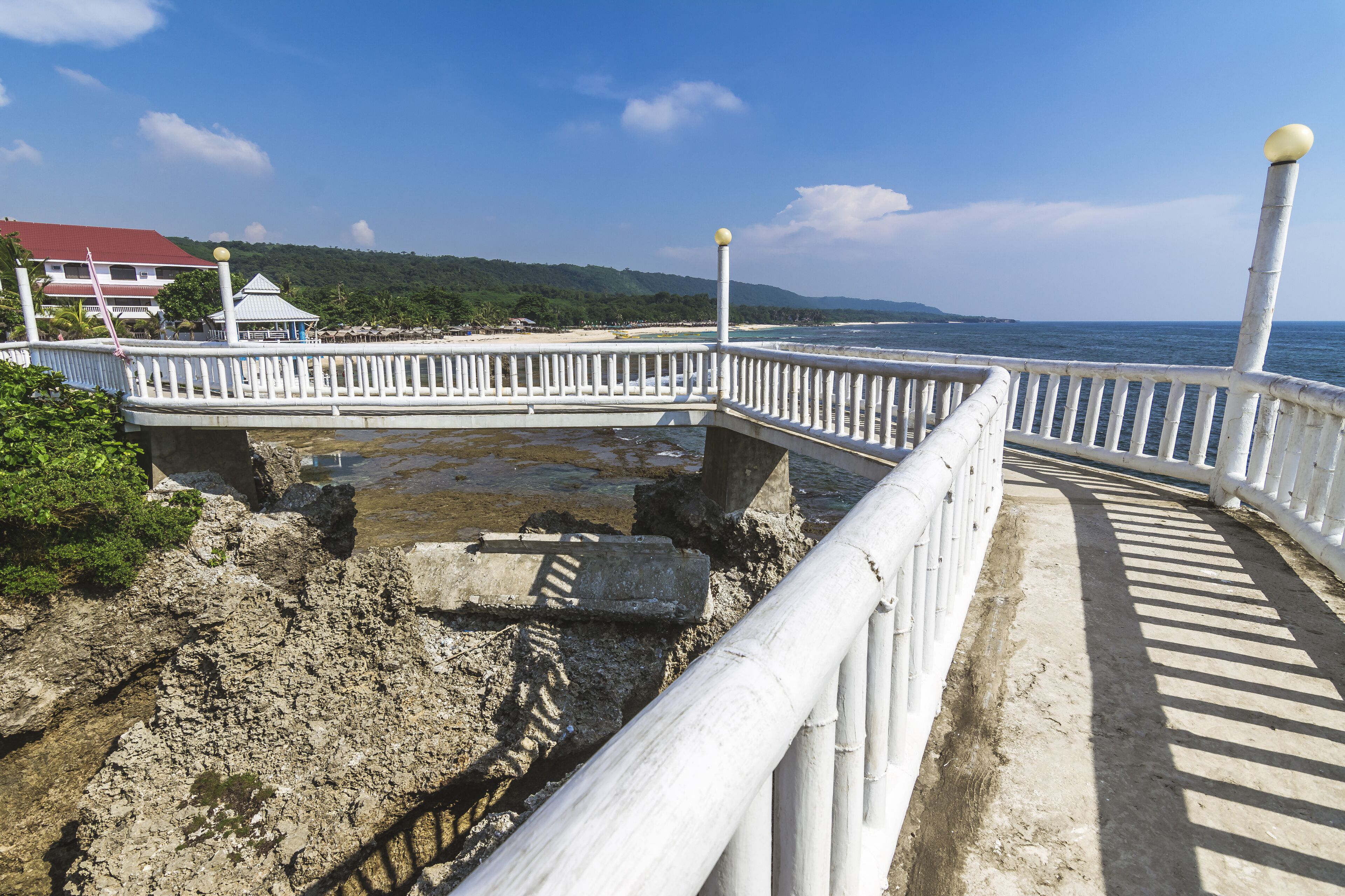 A walkway built on a cliff at a resort in Patar Beach, Bolinao, Pangasinan