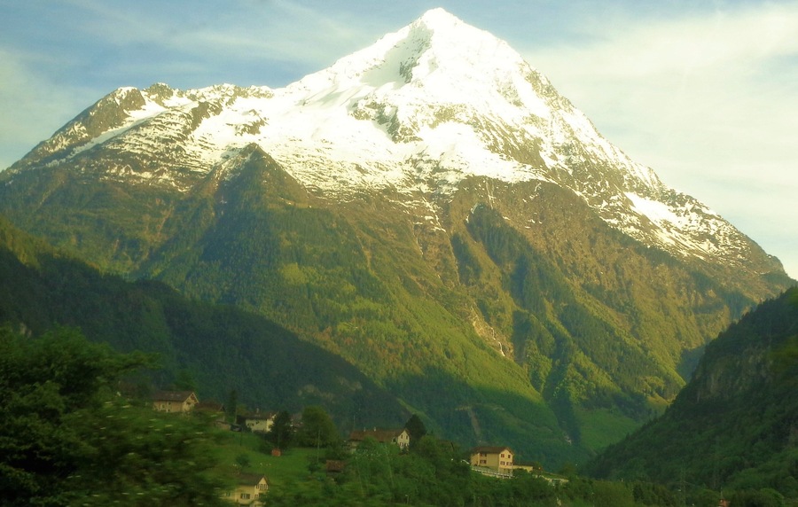 Mt. Bristen in the Canton of Uri. Bristen rises to 3,073 m/10,082 ft. It's a really impressive sight to see from the train! I'd love to do some hiking around there, too :).
