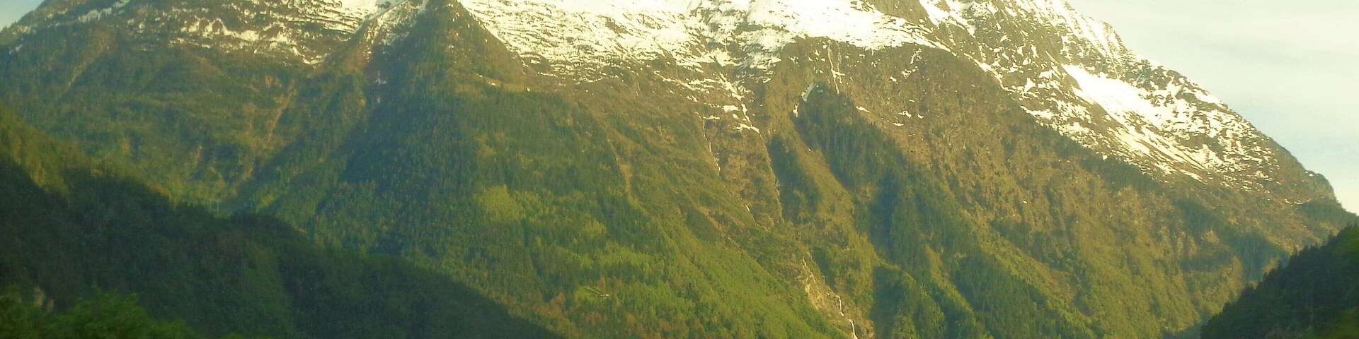 Mt. Bristen in the Canton of Uri. Bristen rises to 3,073 m/10,082 ft. It's a really impressive sight to see from the train! I'd love to do some hiking around there, too :).