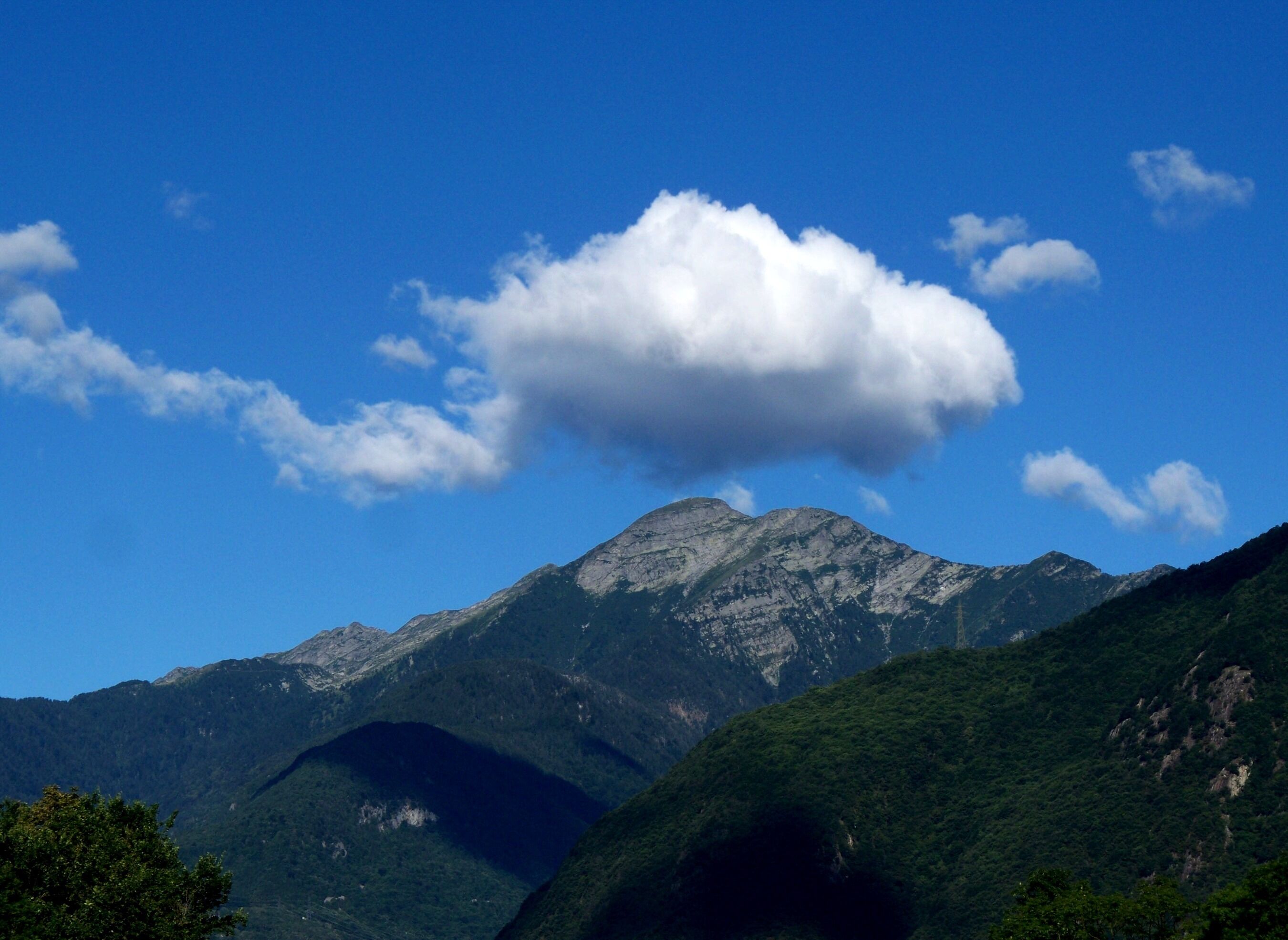 Cloud over Gaggio as seen from San Vittore (Switzerland).