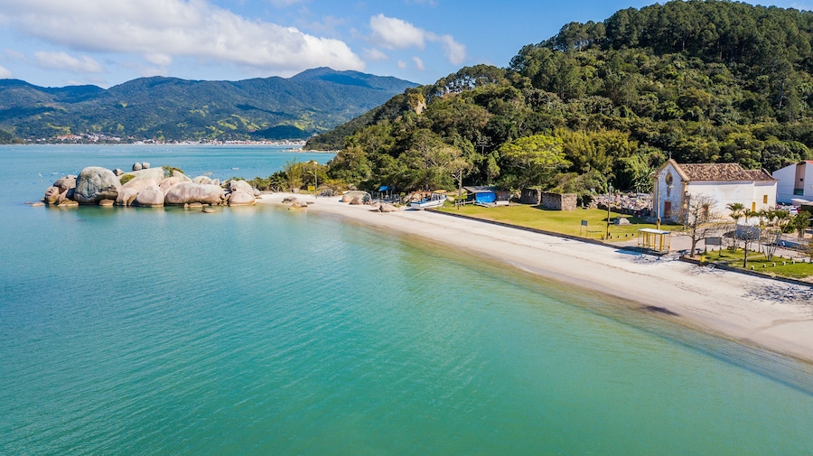 Aerial view of Armação da Piedade beach (Praia da Armação da Piedade) - Governador Celso Ramos. Historical and beatiful beach in Santa Catarina, Brazil
