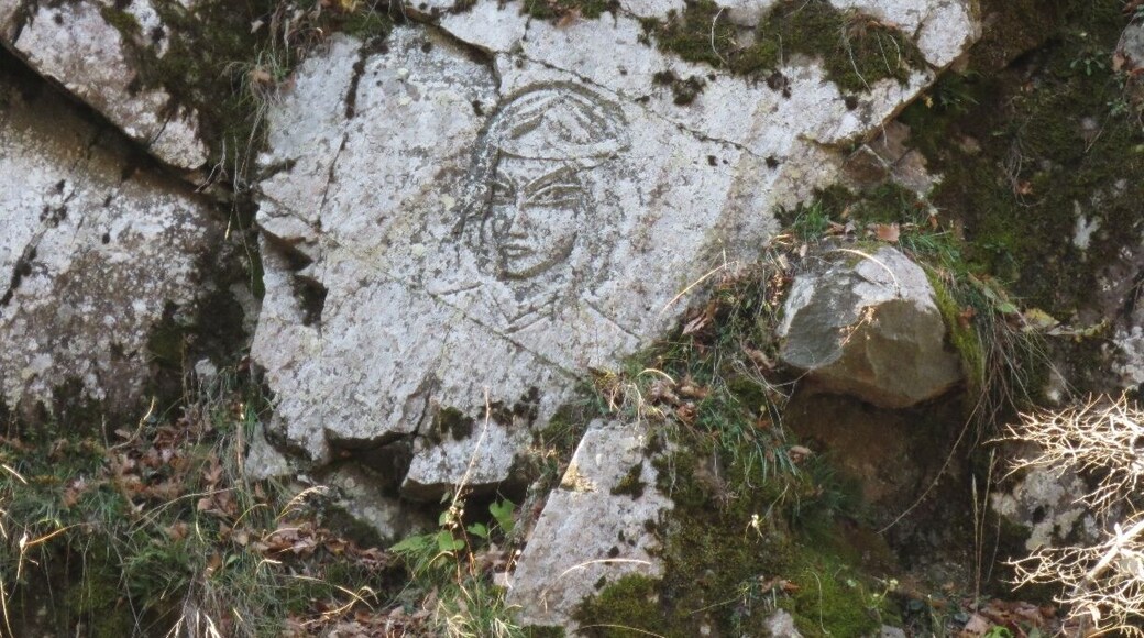The face of a mysterious woman - carved in a rock face.
View from a park in the city of Borjomi, Georgia.
This carving is at least 40 years old (according to the locals). No one knows who the carving is of.