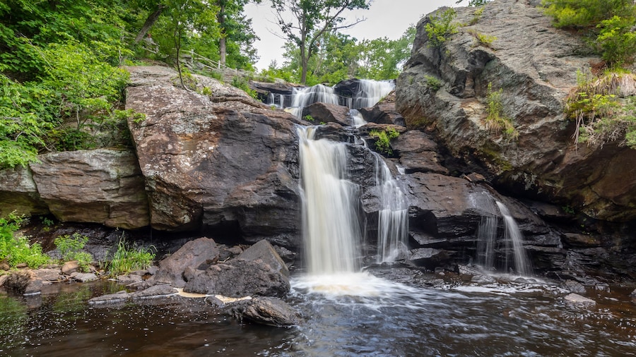 Landscape with waterfall, rocks and leafy green trees at Eightmile River,Chapman Falls, East Haddam, Connecticut Devil's Hopyard State Park