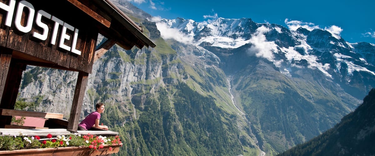Bernese Alps showing mountains as well as an individual female