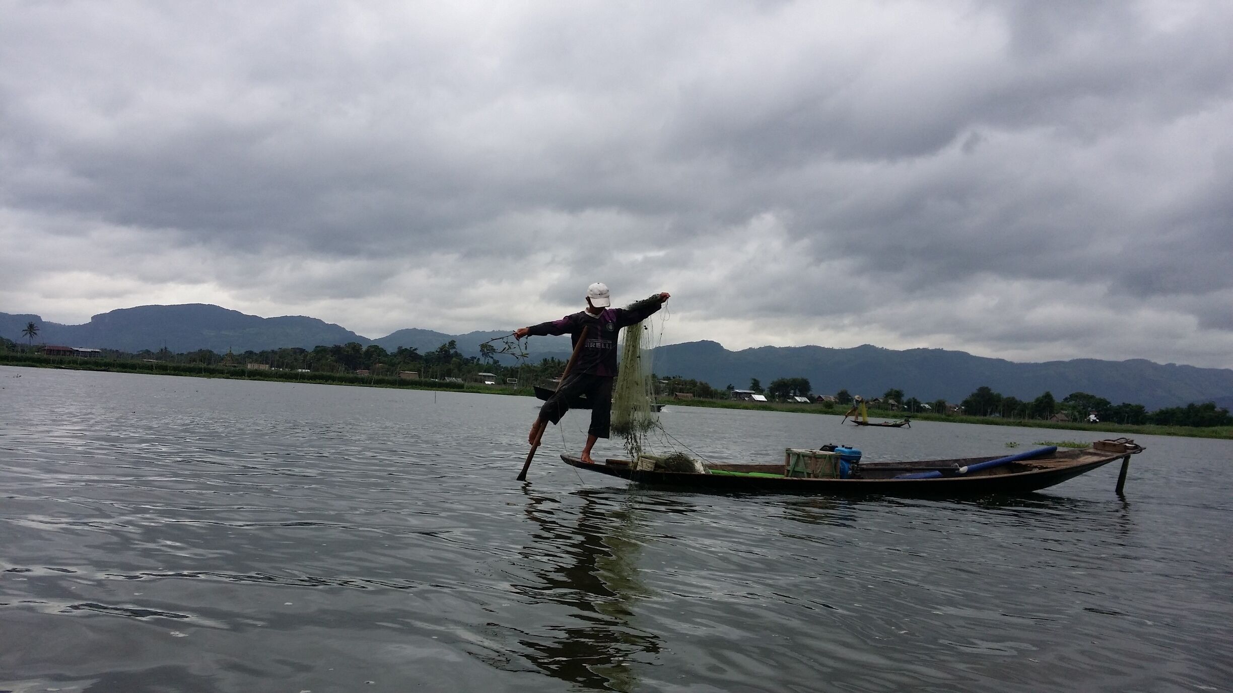 This is how a fisherman chatch fish in Lake Inle. Great Balance!