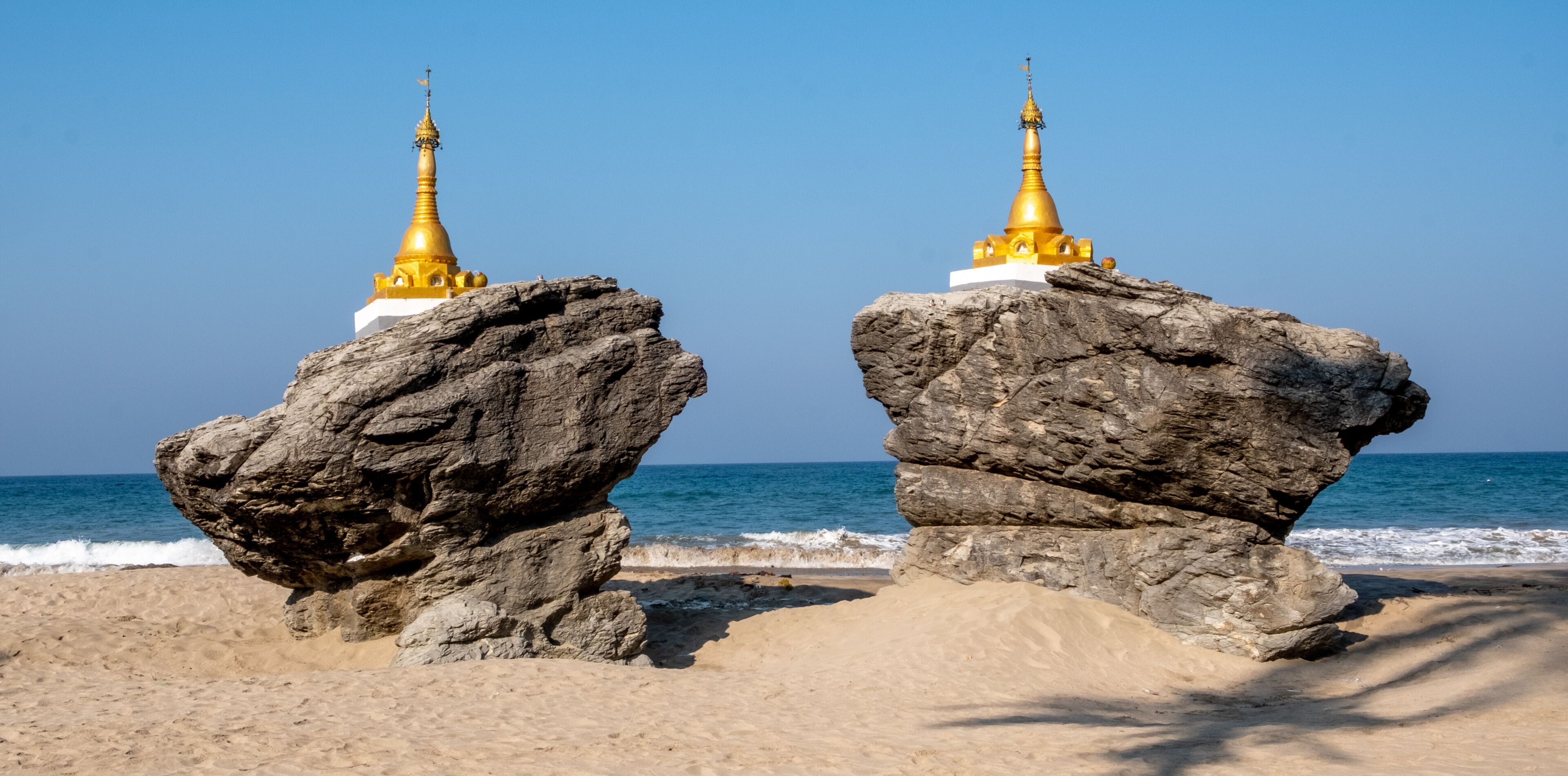 Buddhist stupas at Ngwe Saung Beach on the Bay of Bengal in western Myanmar