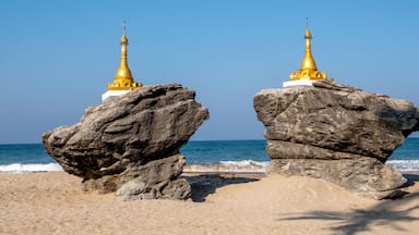 Buddhist stupas at Ngwe Saung Beach on the Bay of Bengal in western Myanmar