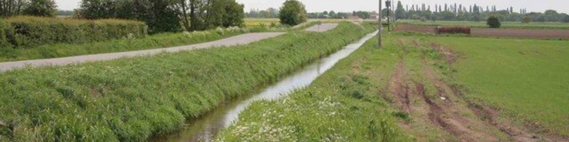 Road and ditch alongside each other Looking from the Wroot road southwards.