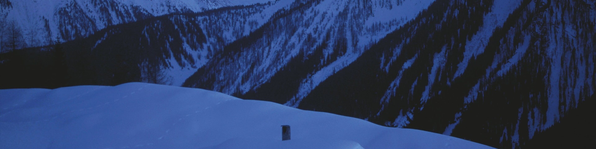 Mayrhofen featuring snow, a house and night scenes