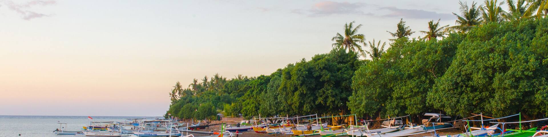 Balinese boats on the shore of Kalibukbuk Lovina