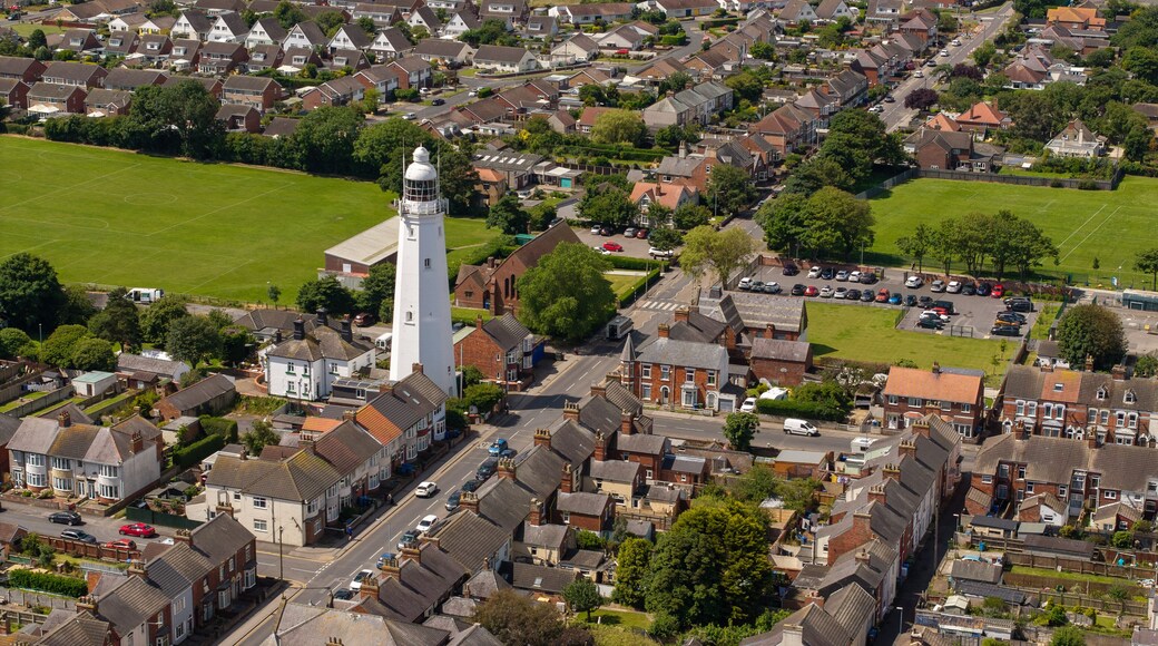 Aerial Withernsea UK.Withernsea is a seaside resort town and civil parish in Holderness, East Riding of Yorkshire, England. Its white inland lighthouse, rising around 127 feet (39 m)