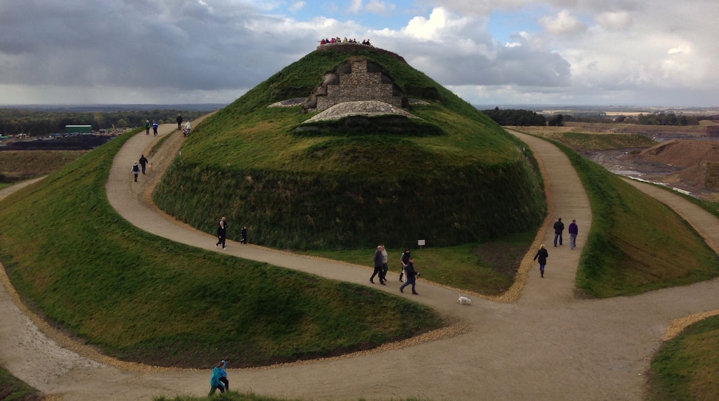 The face of the Northumberlandia land form sculpture, showing her lips, the underside of her nose, eyes and forehead.