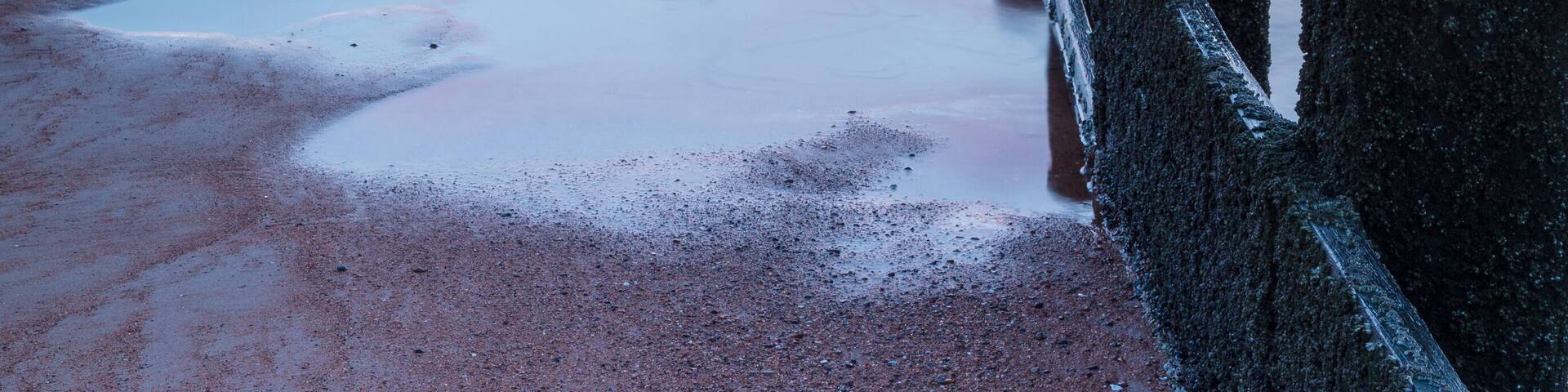 Landscape/Seascape view of Blyth Beach, Northumberland at sunrise.