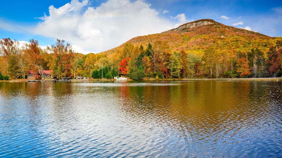 A lake with a mountain in the background.
