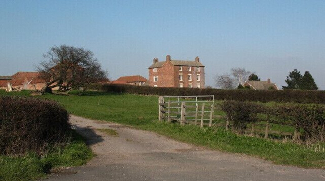 Gringley Grange near Gringley on the Hill A big red-brick farmhouse on the crest of a hill. The style looks late 18th century.