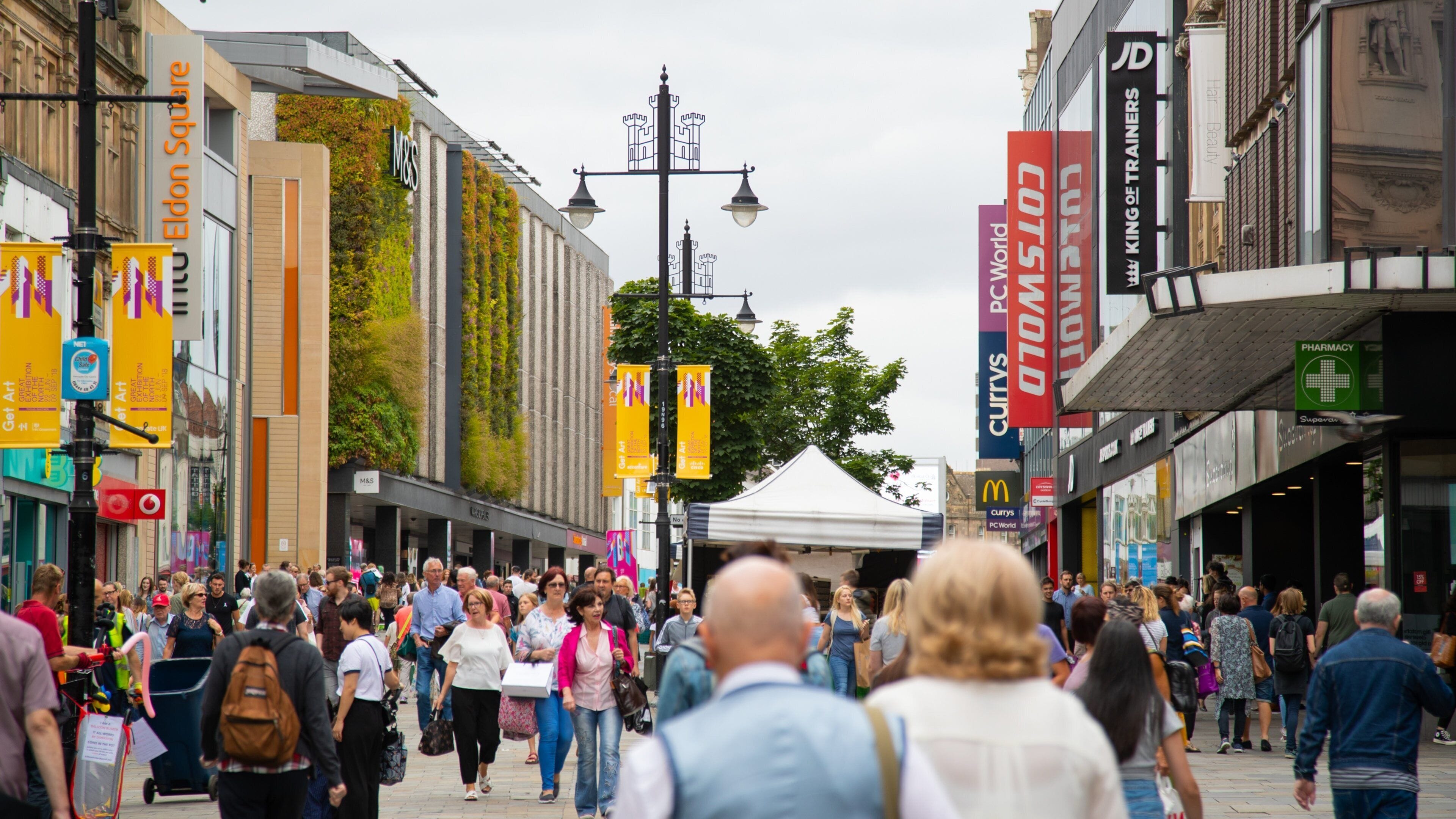 Northumberland Street which includes street scenes as well as a large group of people
