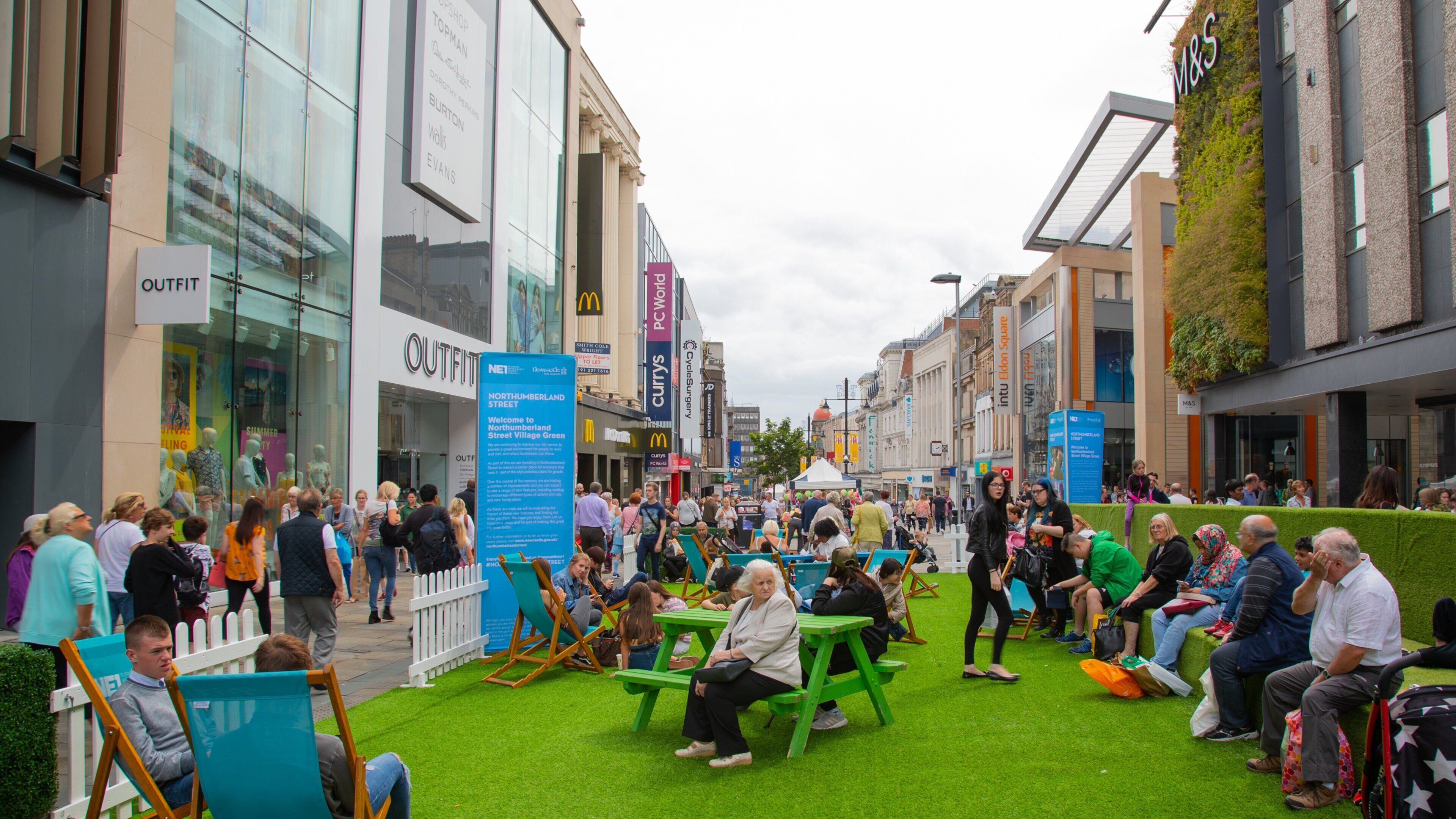 Northumberland Street featuring street scenes as well as a large group of people