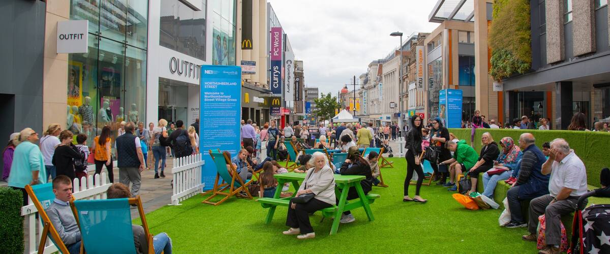 Northumberland Street featuring street scenes as well as a large group of people