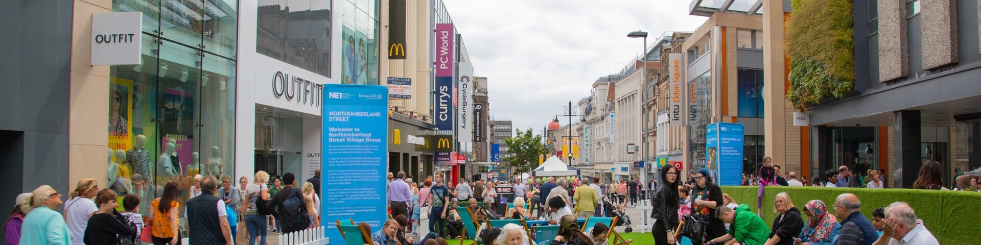 Northumberland Street featuring street scenes as well as a large group of people