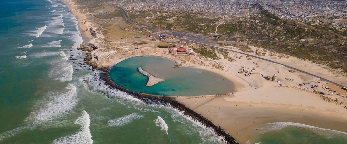 Aerial view of Monwabisi tidal pool Khayelitsha popular destination of swimmers, Cape Town, South Africa.