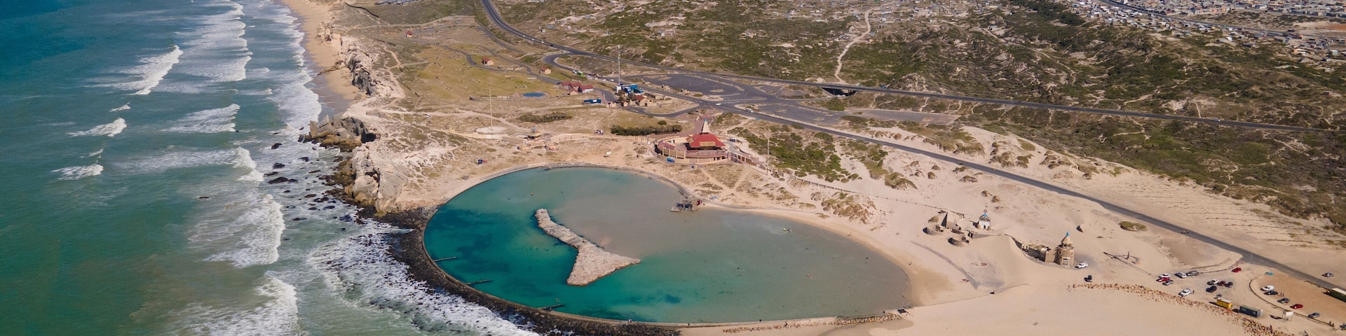 Aerial view of Monwabisi tidal pool Khayelitsha popular destination of swimmers, Cape Town, South Africa.