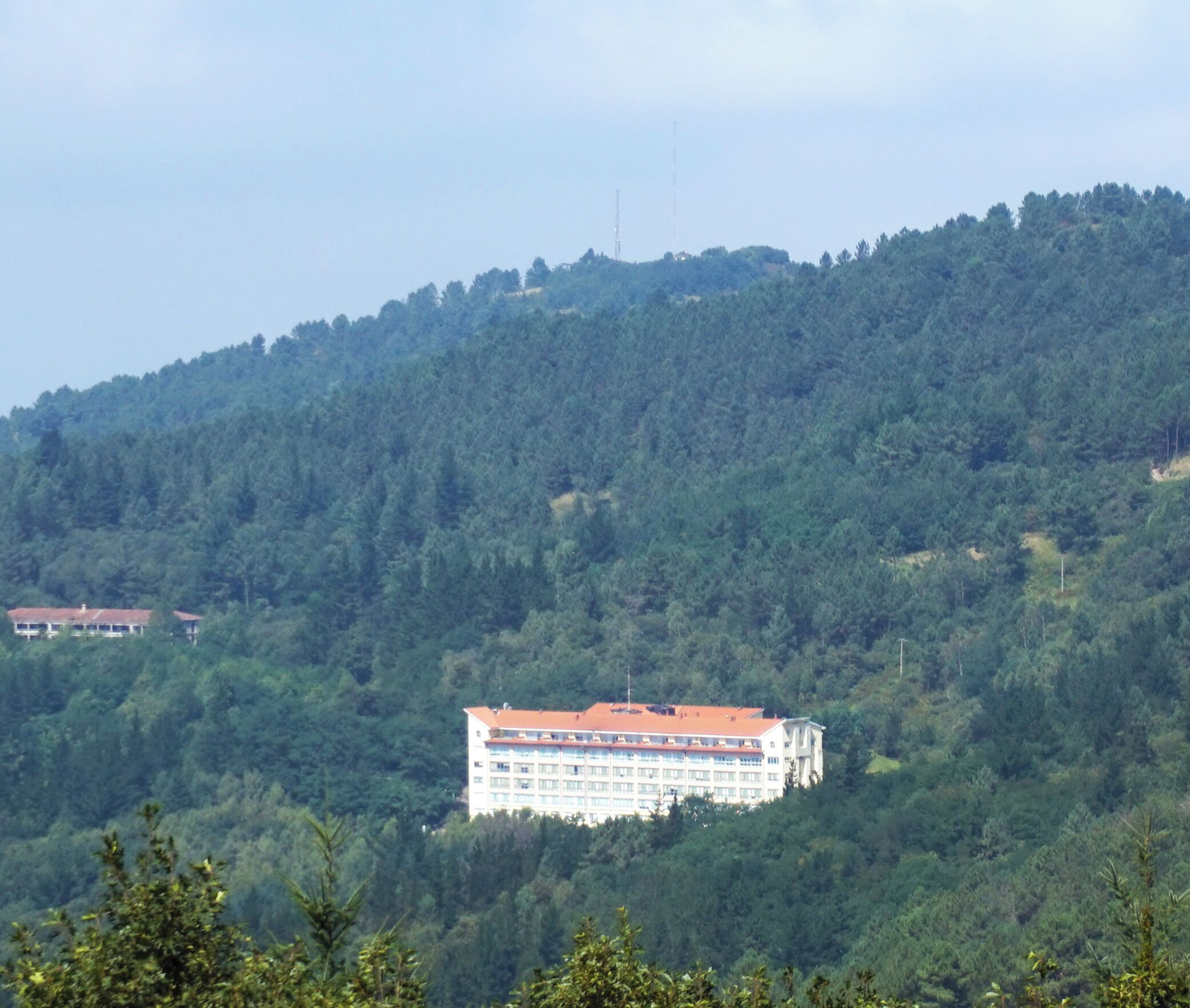 The building Hospital de Santa Marina, Bilbao. View from a forest in Exebarri.