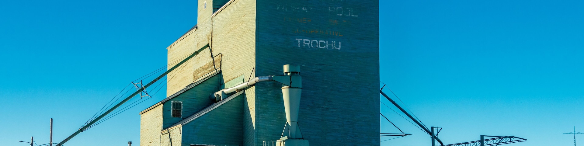 Grain elevator reaches to the sky. Trochu, Alberta, Canada