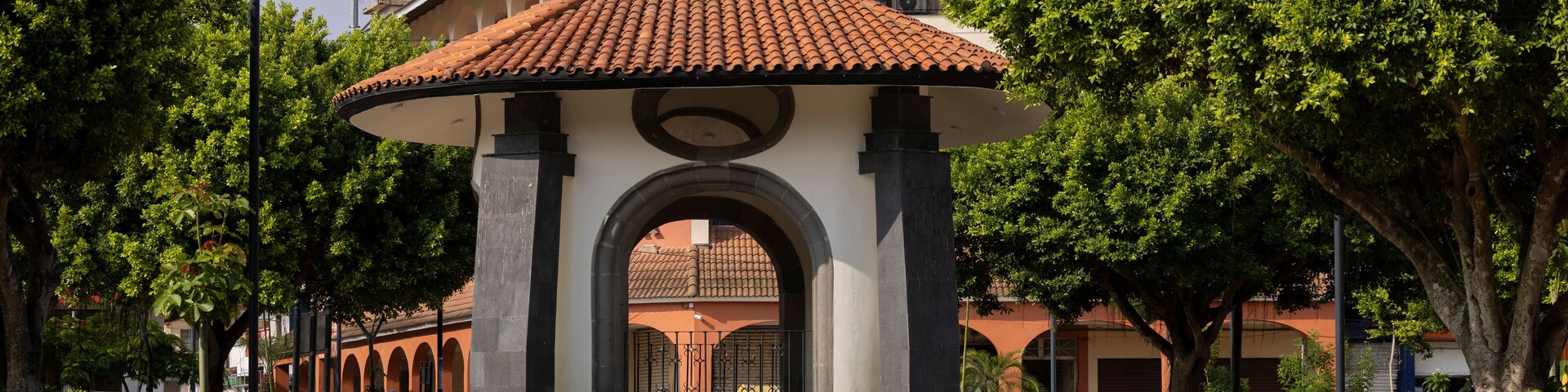 Morning sun shines on the kiosk bandstand in the central plaza of Acayucan, Veracruz, Mexico.