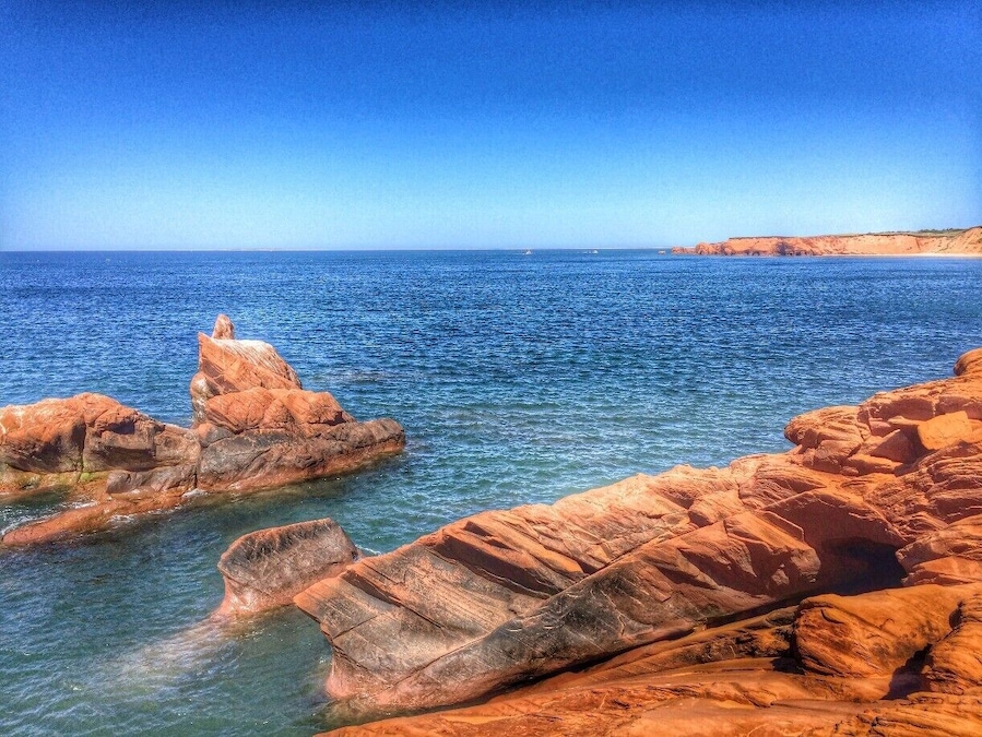 A short hike from the beach, La Bluff offers spectacular views of the red cliffs - which are famous on Îles de la Madeleine. A truly magical sight.