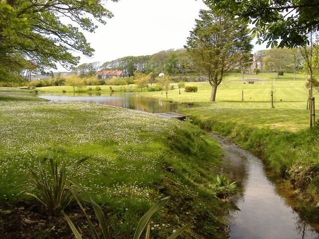 The grounds of Billown mansion. Landscaped area below the mansion (in the trees to the right).