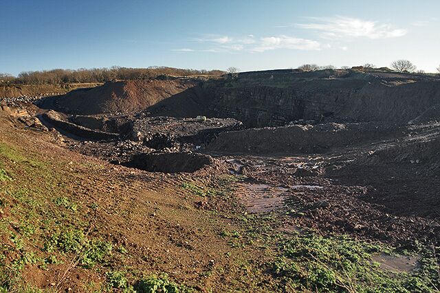 Disused quarry at Billown Looks as if it's being filled in.
