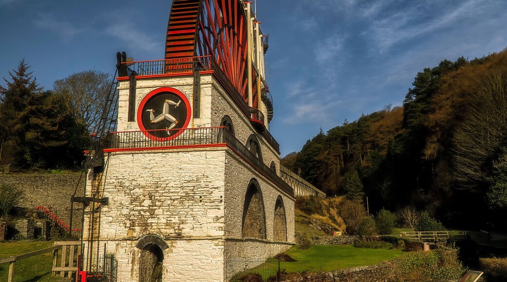 The Laxey Wheel which is also known as Lady Isabella is built into the hillside above the village of Laxey in the Isle of Man. It was built in 1854 to pump water from the Glen Mooar part of the Great Laxey Mines industrial complex It is the largest working waterwheel in the world.