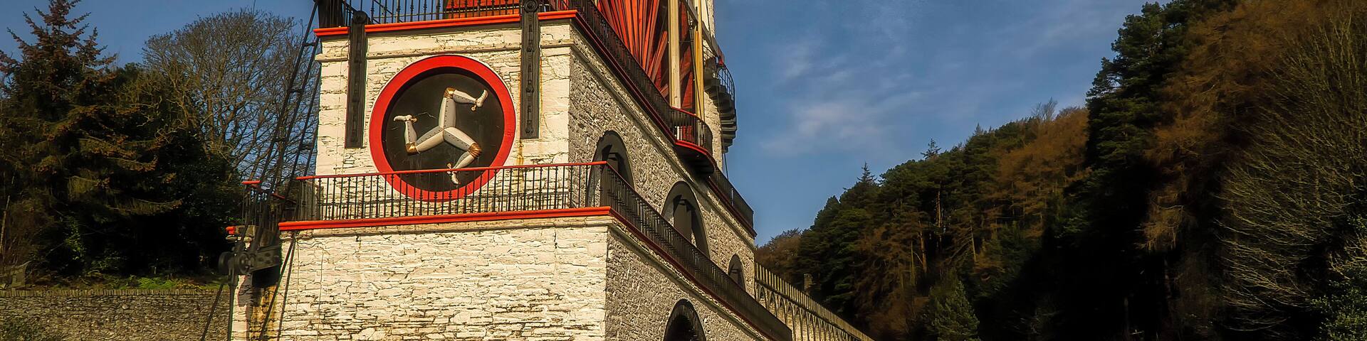 The Laxey Wheel which is also known as Lady Isabella is built into the hillside above the village of Laxey in the Isle of Man. It was built in 1854 to pump water from the Glen Mooar part of the Great Laxey Mines industrial complex It is the largest working waterwheel in the world.