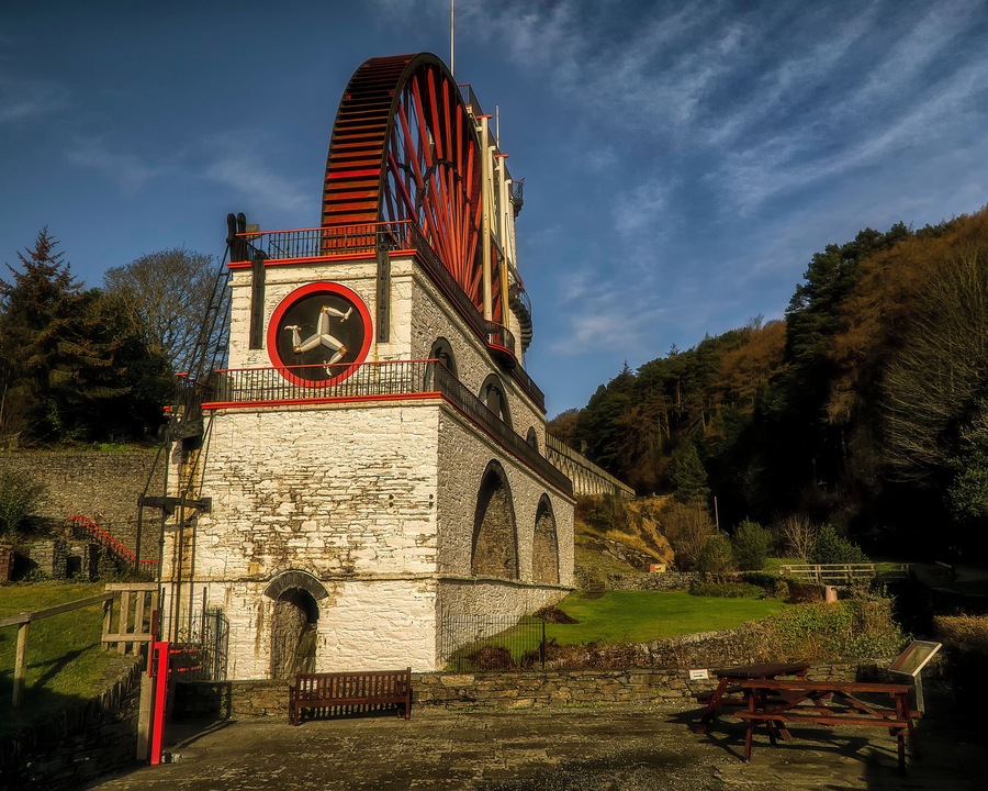 The Laxey Wheel which is also known as Lady Isabella is built into the hillside above the village of Laxey in the Isle of Man. It was built in 1854 to pump water from the Glen Mooar part of the Great Laxey Mines industrial complex It is the largest working waterwheel in the world.
