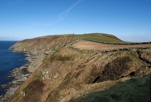 Contrary Head and Peel Hill. Isle of Man. Taken from the coastal footpath between Peel and Glen Maye. Corrin's Folly can be seen on the skyline.