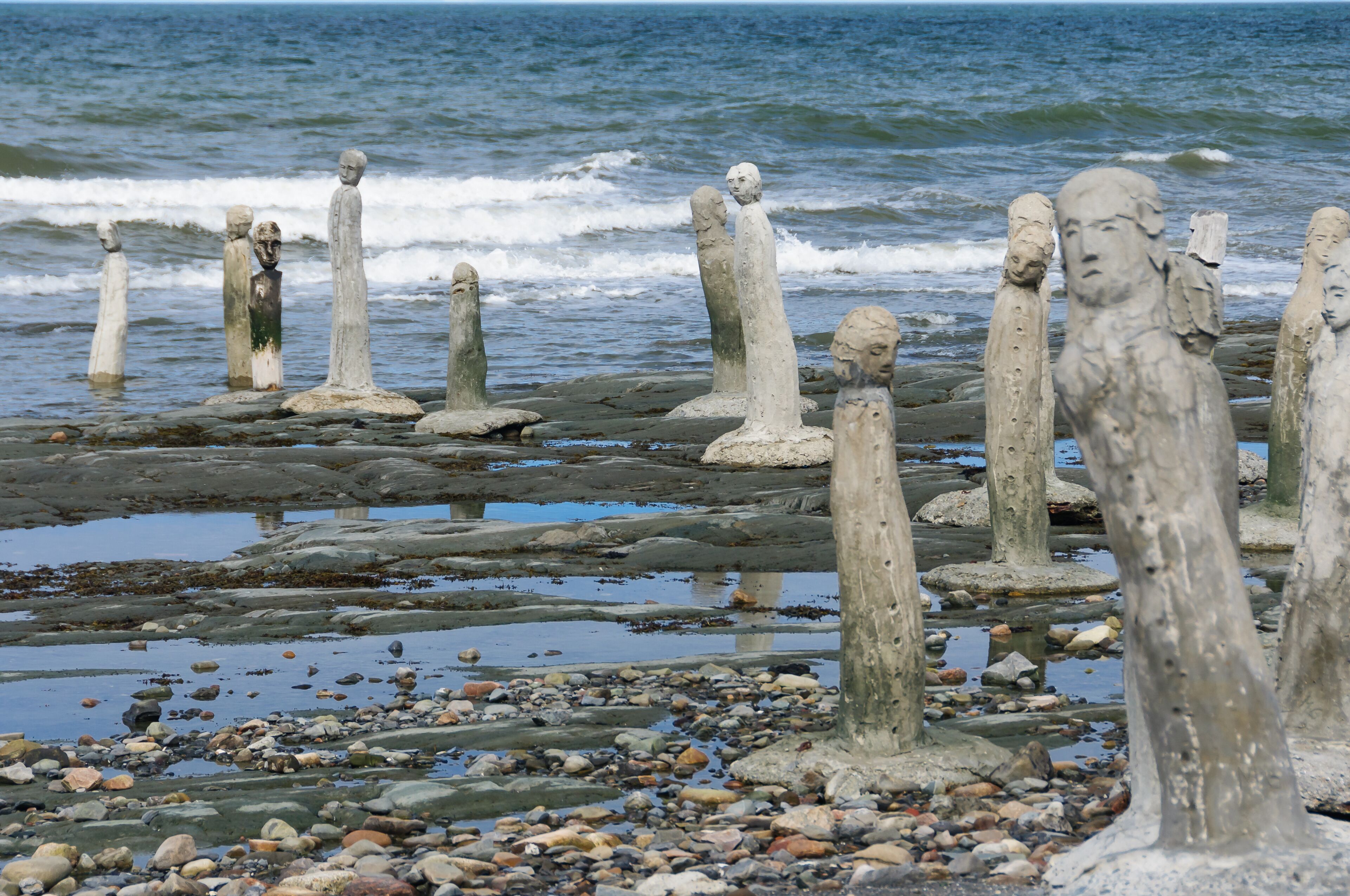 stonework statues leading into the St. Laurence River, Quebec, Canada