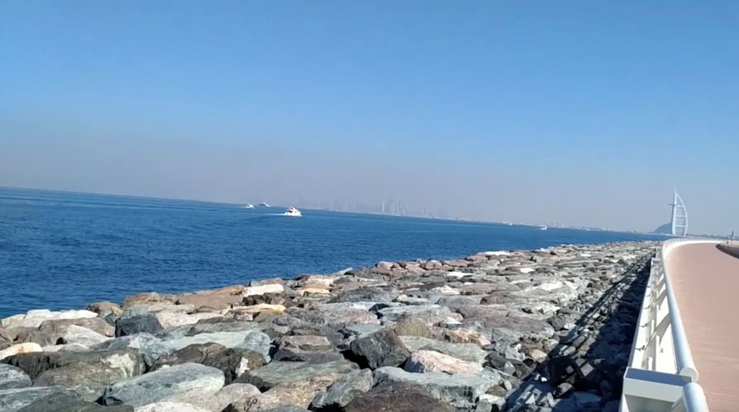 Blue Waters with rocky shore. Impeccable architecture of Burj Al Arab in backdrop all crafted on a man made island.
#LifeAtExpedia