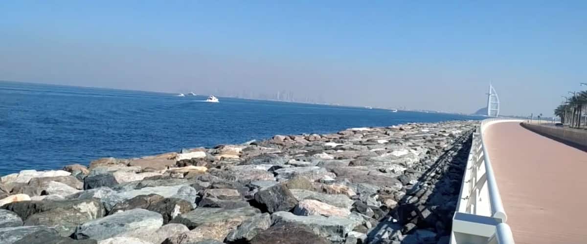 Blue Waters with rocky shore. Impeccable architecture of Burj Al Arab in backdrop all crafted on a man made island.
#LifeAtExpedia