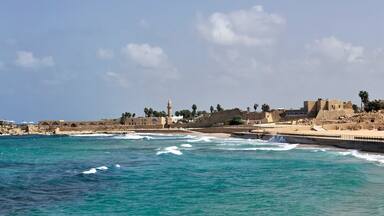 anciant harbor ruins of caesarea in israel