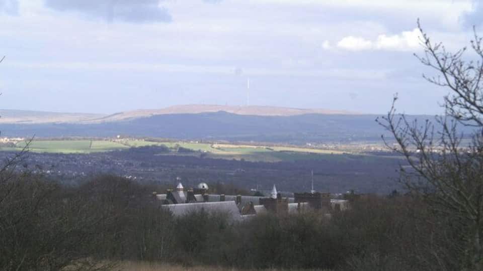 Over the top. ...of the rooftops former RC Seminary and College, Winter Hill's distinctive television mast stands out.
