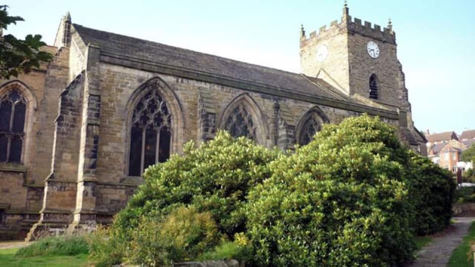 Nave and west tower of St Thomas the Martyr's parish church, Up Holland, Lancashire, England, seen from the northeast