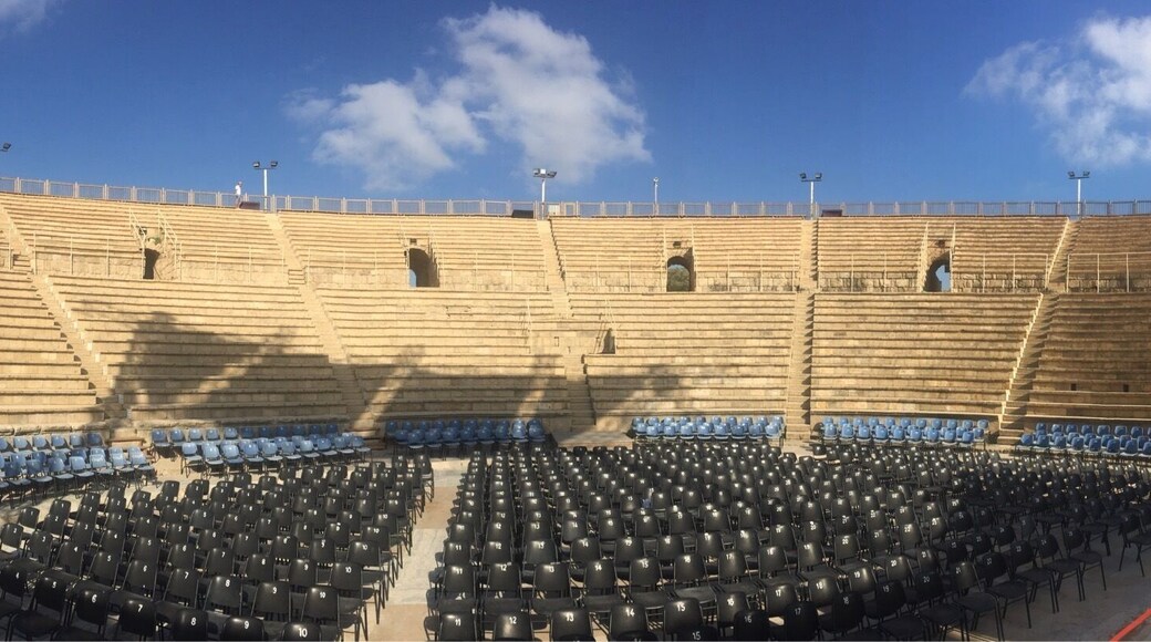 This amphitheater is still used for concerts. They were setting up for an event.