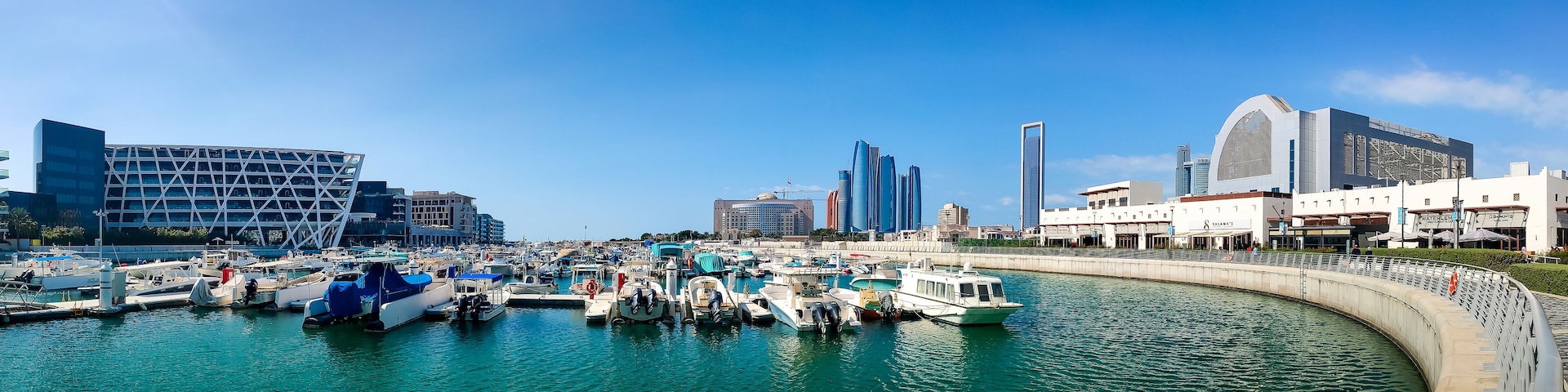 Al Marasy Marina with luxury yachts and Abu Dhabi downtown area view