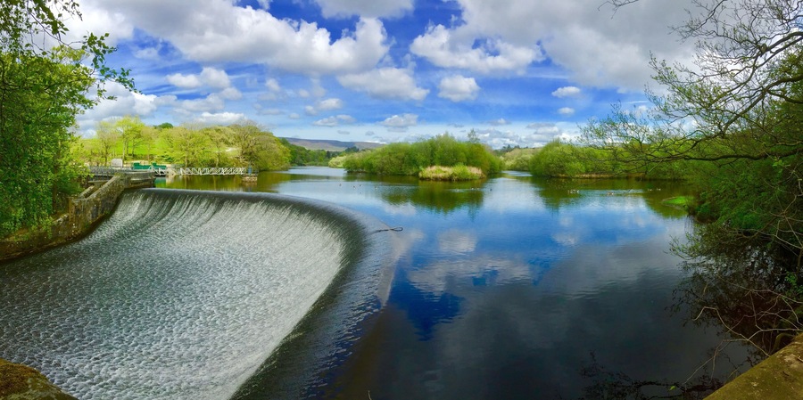 The River Wyre at Abbeystead. Park at Stoops Bridge to walk through woodland and around the reservoir to the dam.